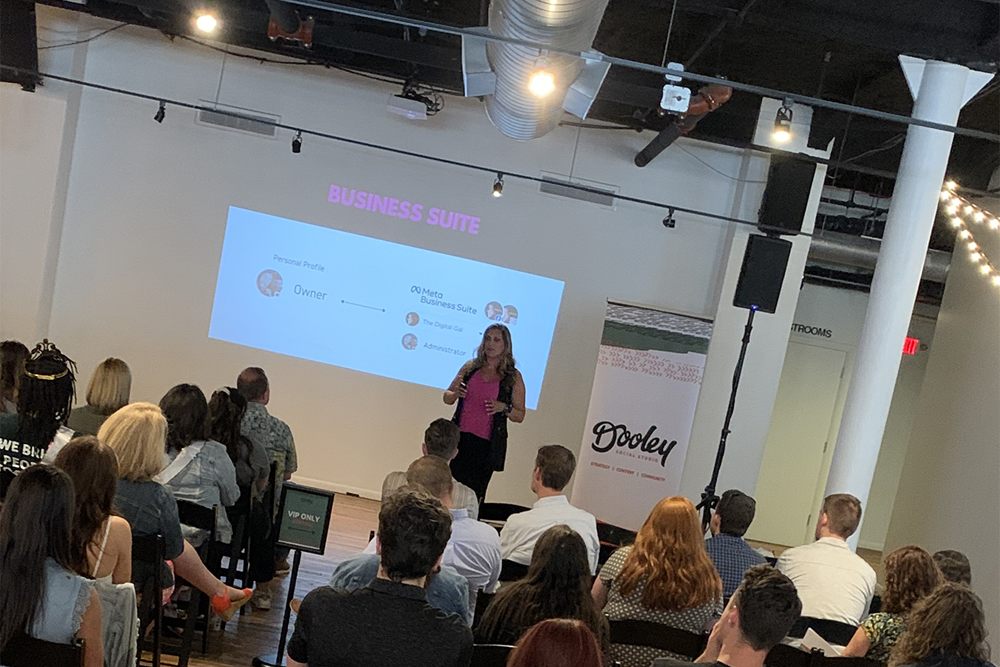 Amanda presenting to the audience at the Dooley Social Studio Show and Tell