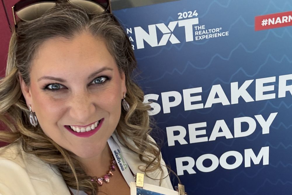 Amanda with her speaker badge in the Speaker Ready Room at NAR NXT 2024 in Boston